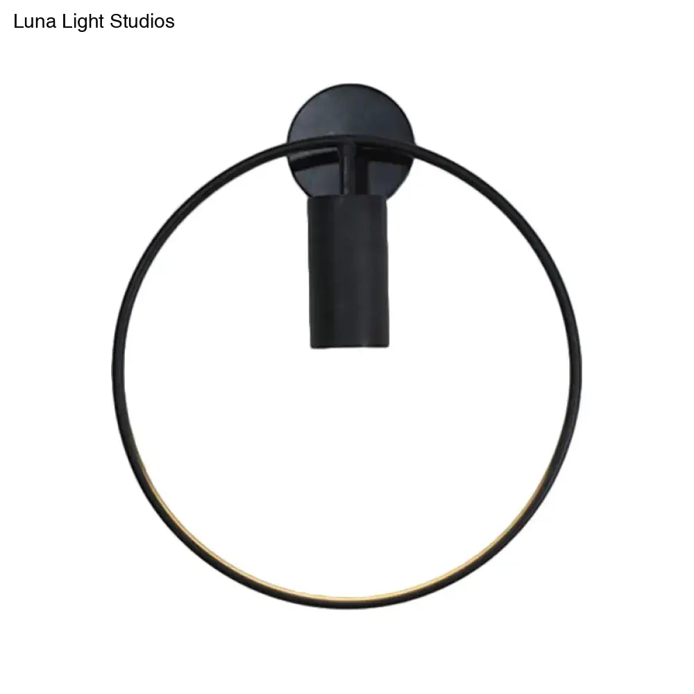 Minimalist black circular metal sconce – living room wall light