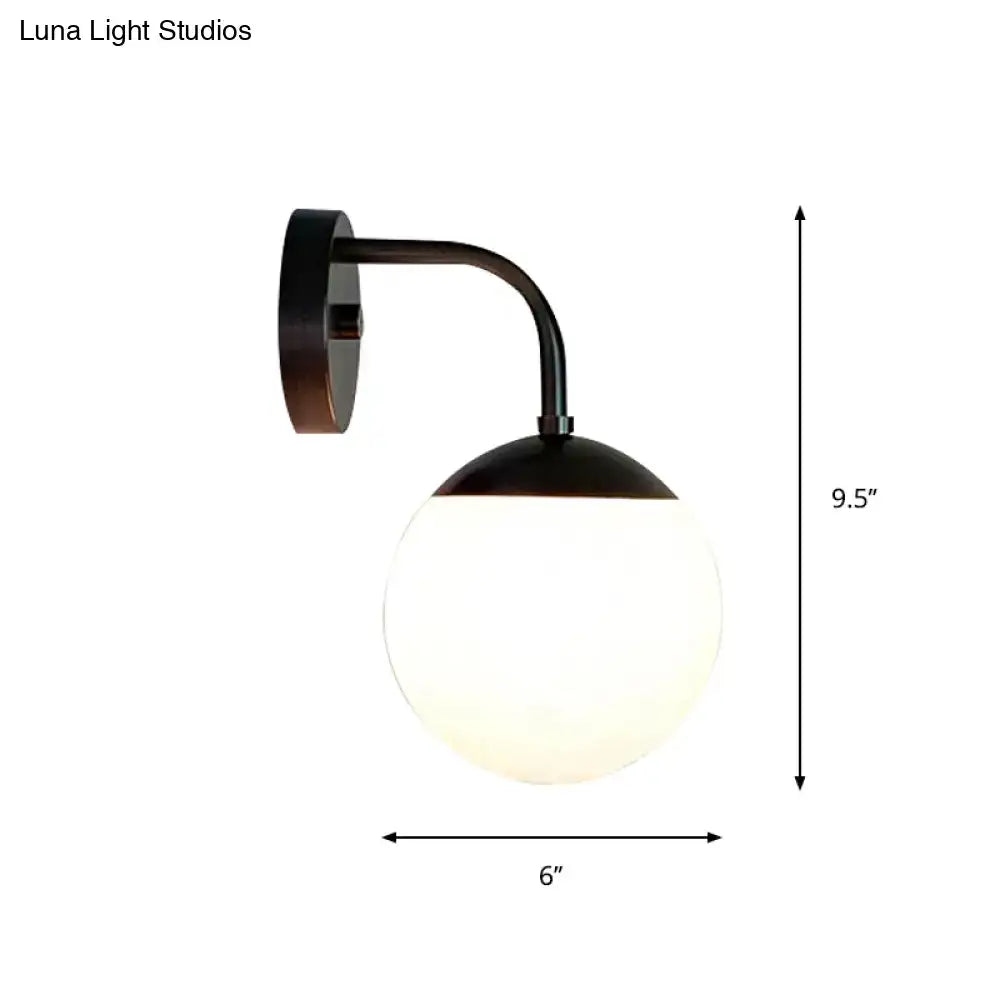 Minimalist black & gold wall light with milky glass ball for bedroom