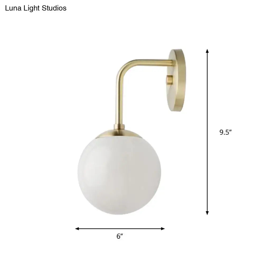 Minimalist black & gold wall light with milky glass ball for bedroom