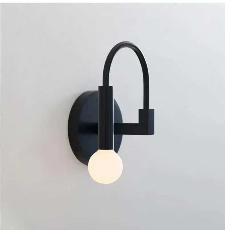 Minimalist black modern wall lamp bedroom curved sconce