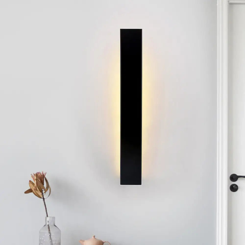 Minimalist black & white aluminum shade direct wired sconce bedroom