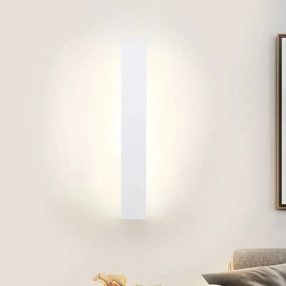 Minimalist black & white aluminum shade direct wired sconce bedroom