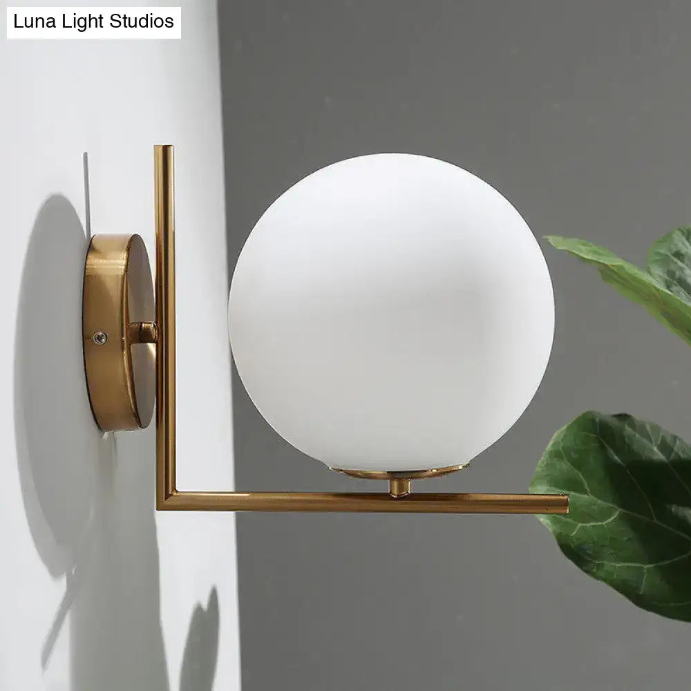 Minimalist brass angle arm opaline glass wall sconce bedroom light