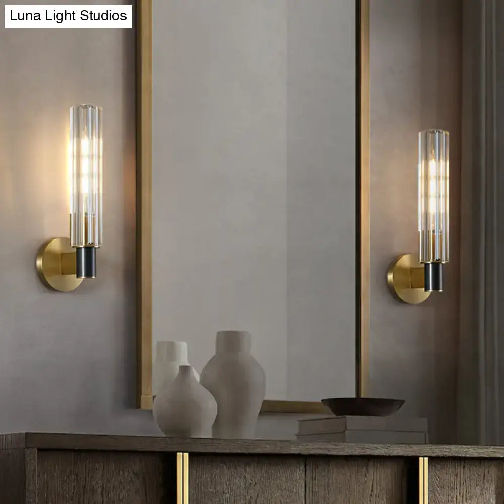 Minimalist brass finish tubular wall light sconce for bedroom