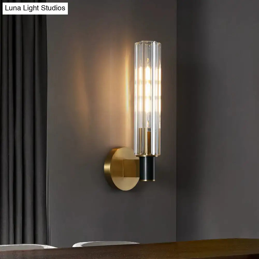 Minimalist brass finish tubular wall light sconce for bedroom