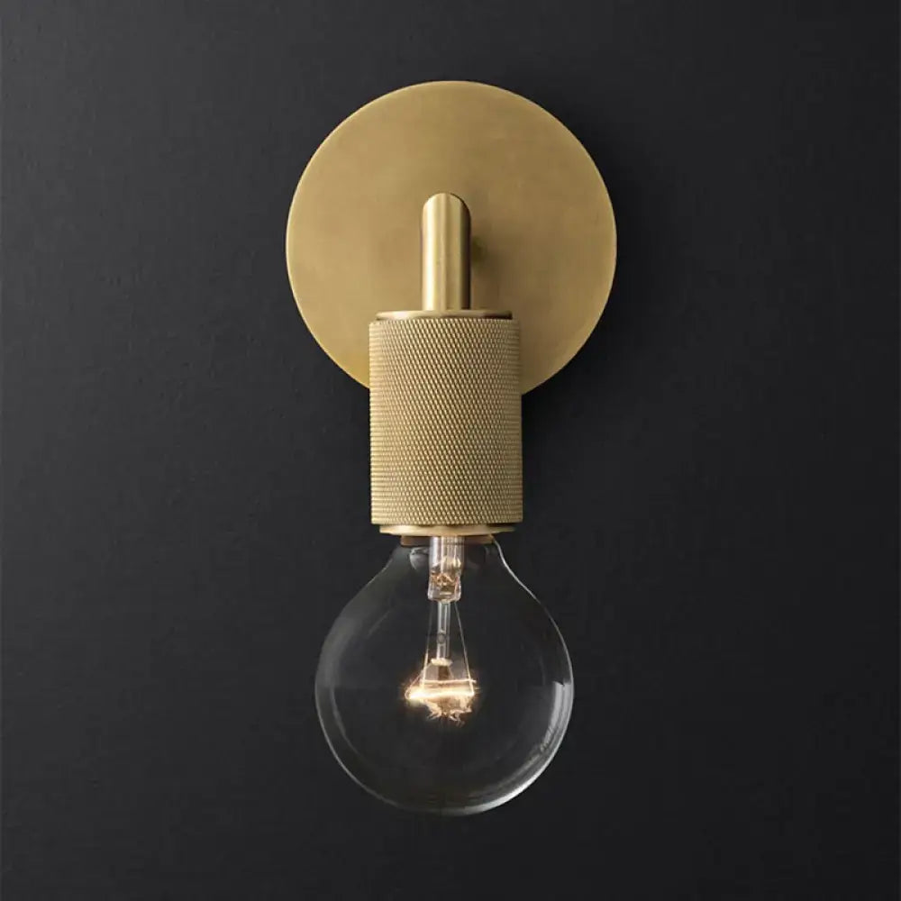 Minimalist bronze wall sconce with glass shade bedroom light