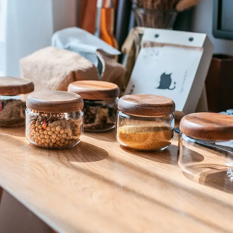 Minimalist clear glass kitchen storage jar with acacia wood lid
