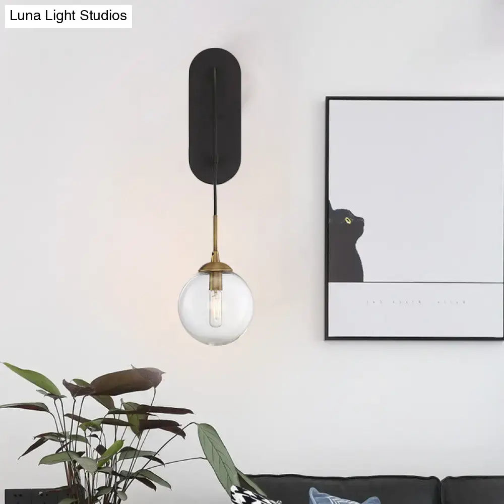 Minimalist clear glass wall mounted sconce black & brass bedroom light