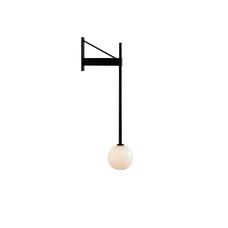 Minimalist geometric iron wall lamp with glass globe for bedroom