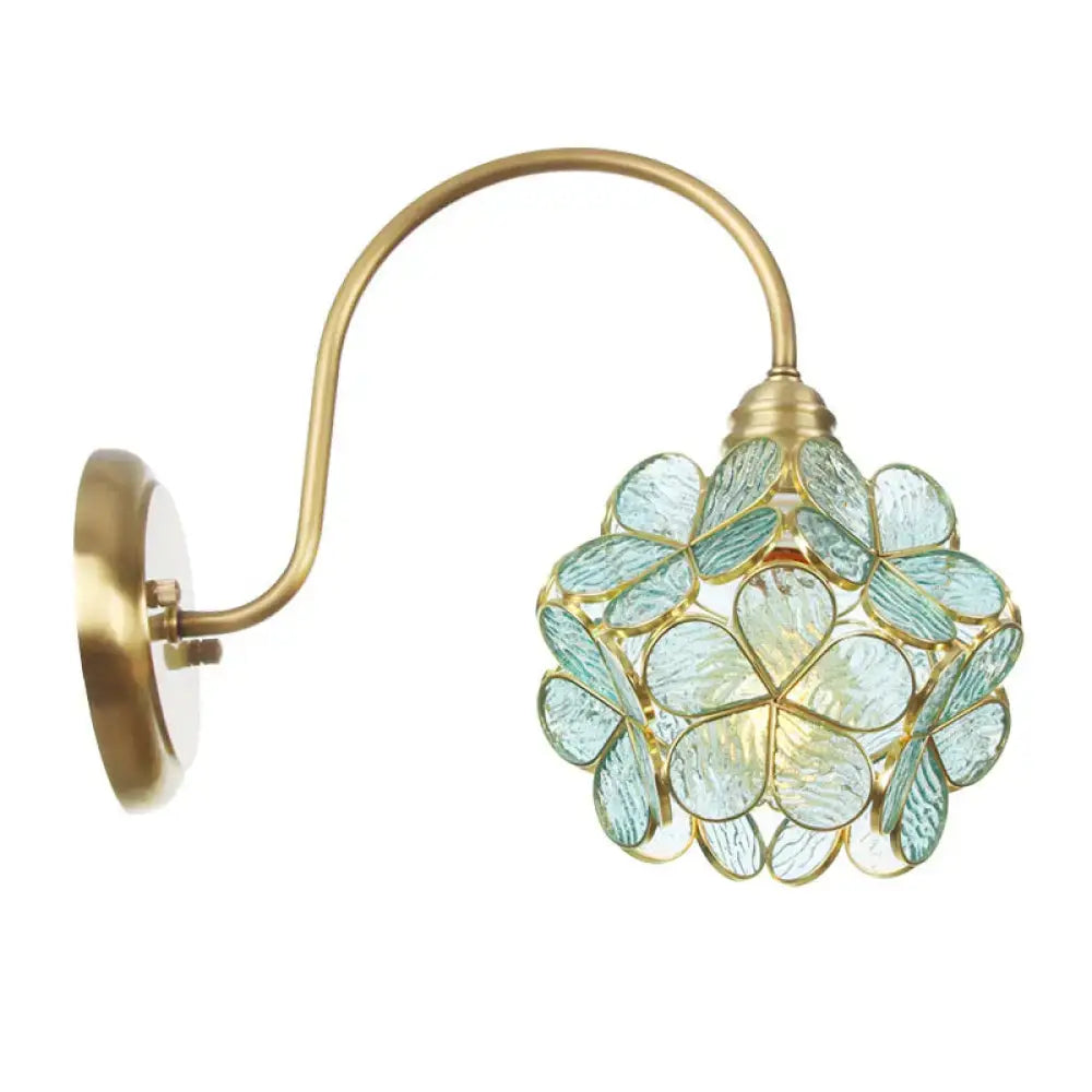 Minimalist gold floral wall sconce with glass shade for living room