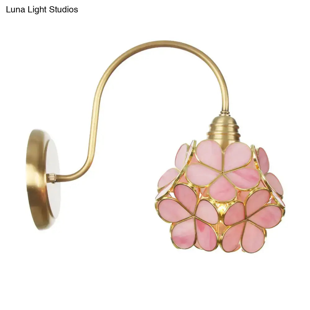 Minimalist gold floral wall sconce with glass shade for living room