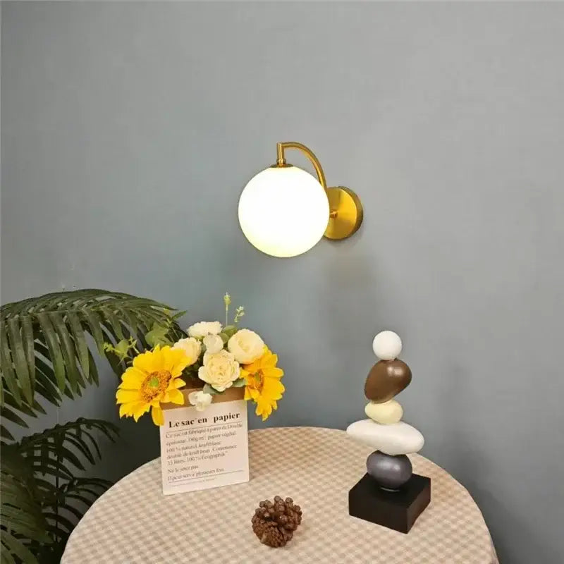 Minimalist gold glass ball wall sconce for bedroom