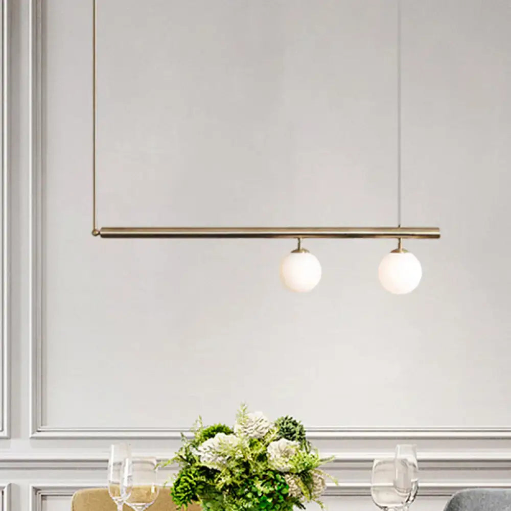 Minimalist golden glass sphere pendant light dining room