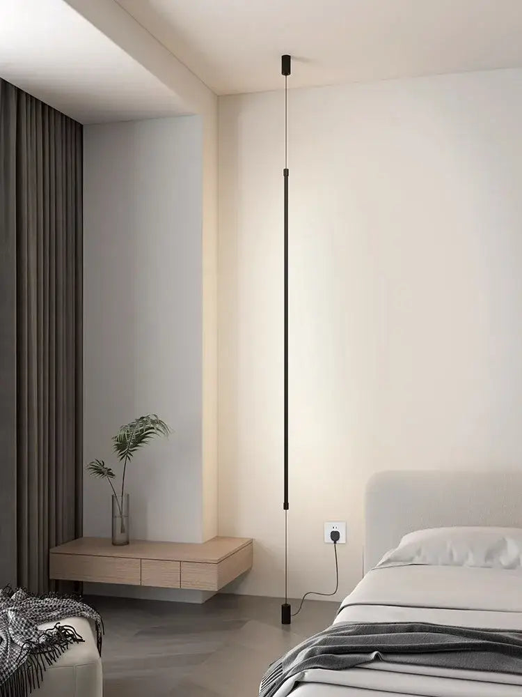 Minimalist matte black cylindrical pendant light strip bedroom