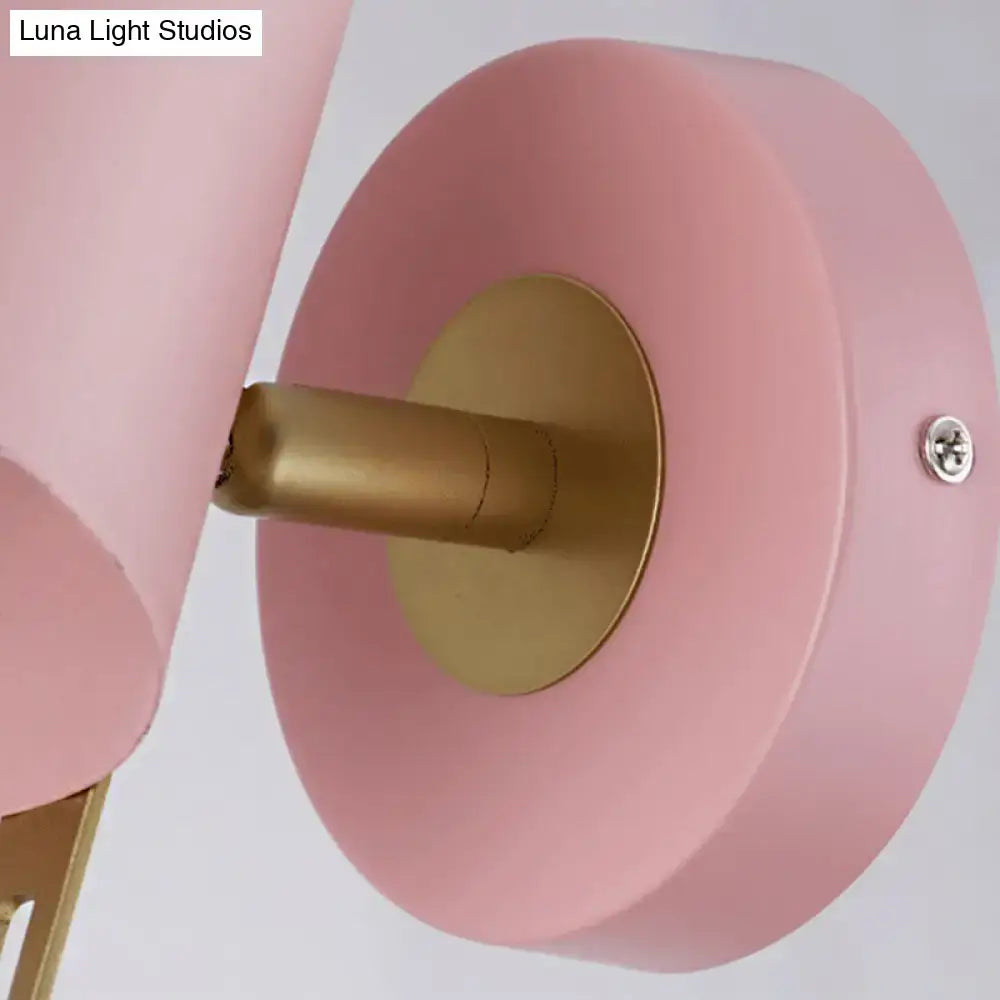 Minimalist pink and brass cylinder wall sconce – corridor light