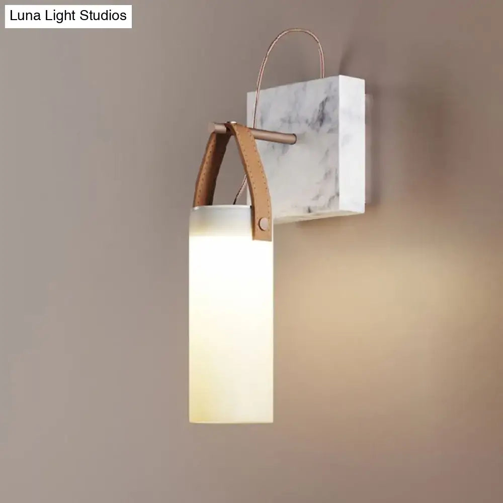 Minimalist white glass wall light with leather strap for bedroom