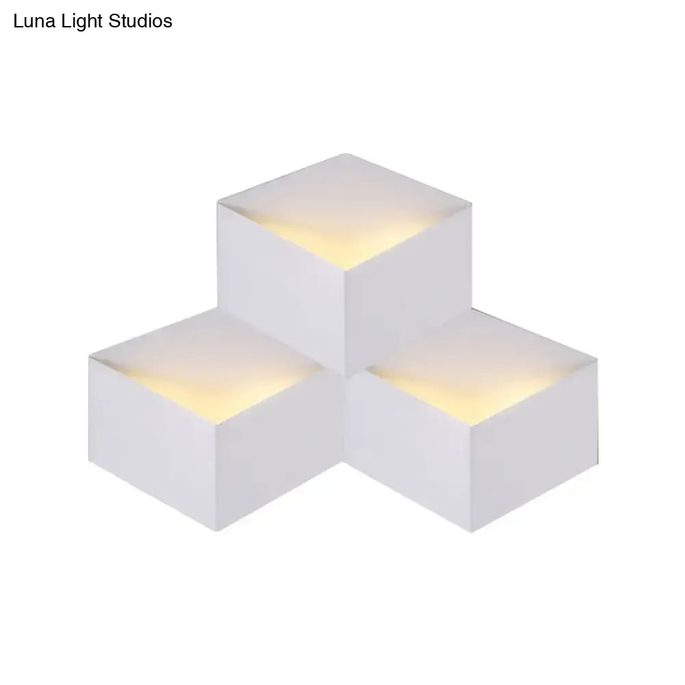 Minimalist white metallic geometric wall mount light for corridor