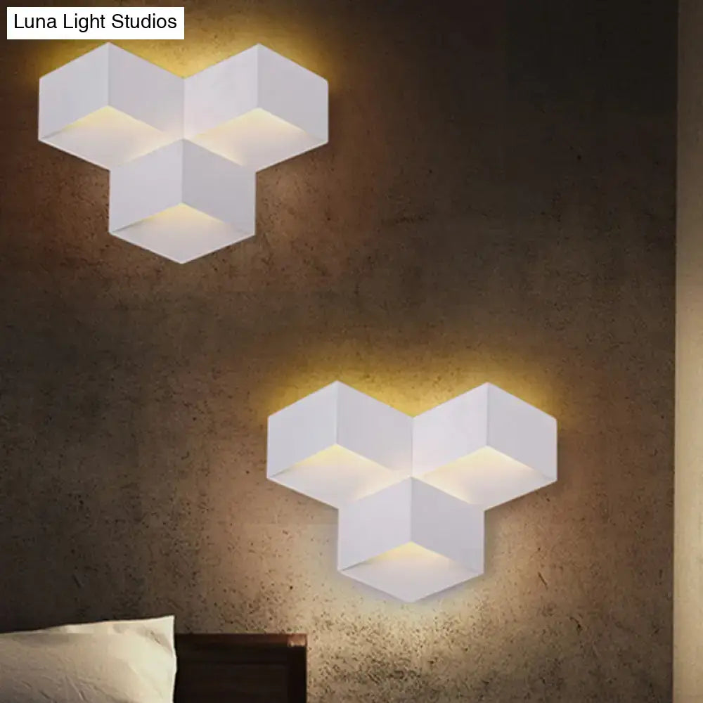 Minimalist white metallic geometric wall mount light for corridor