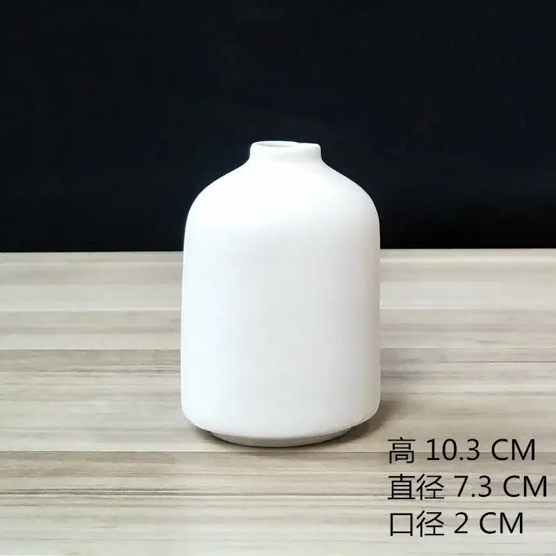 Minimalist white & terracotta decorbites ceramic vase dining room decor
