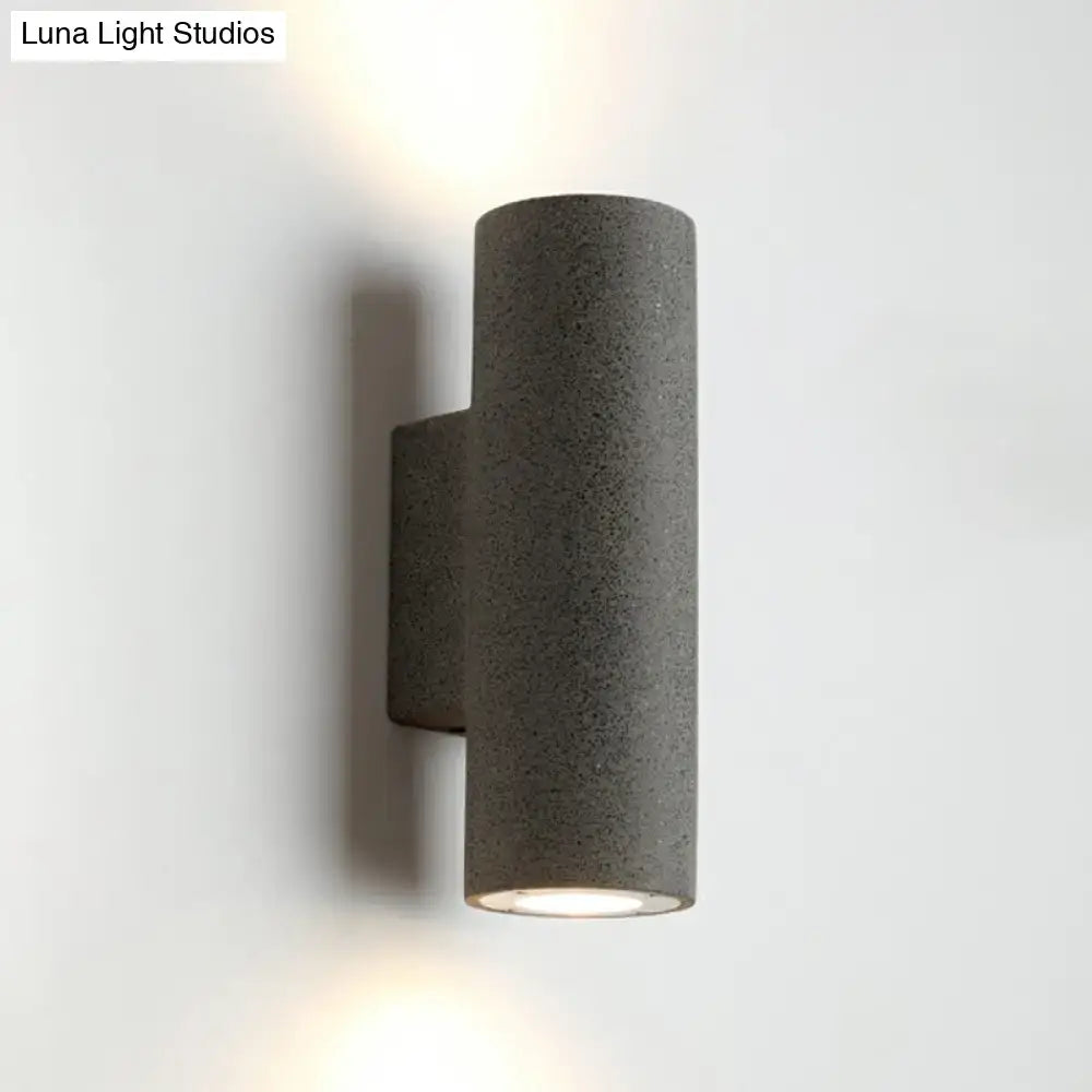 Minimalist white terrazzo stair wall sconce with compact fixture height