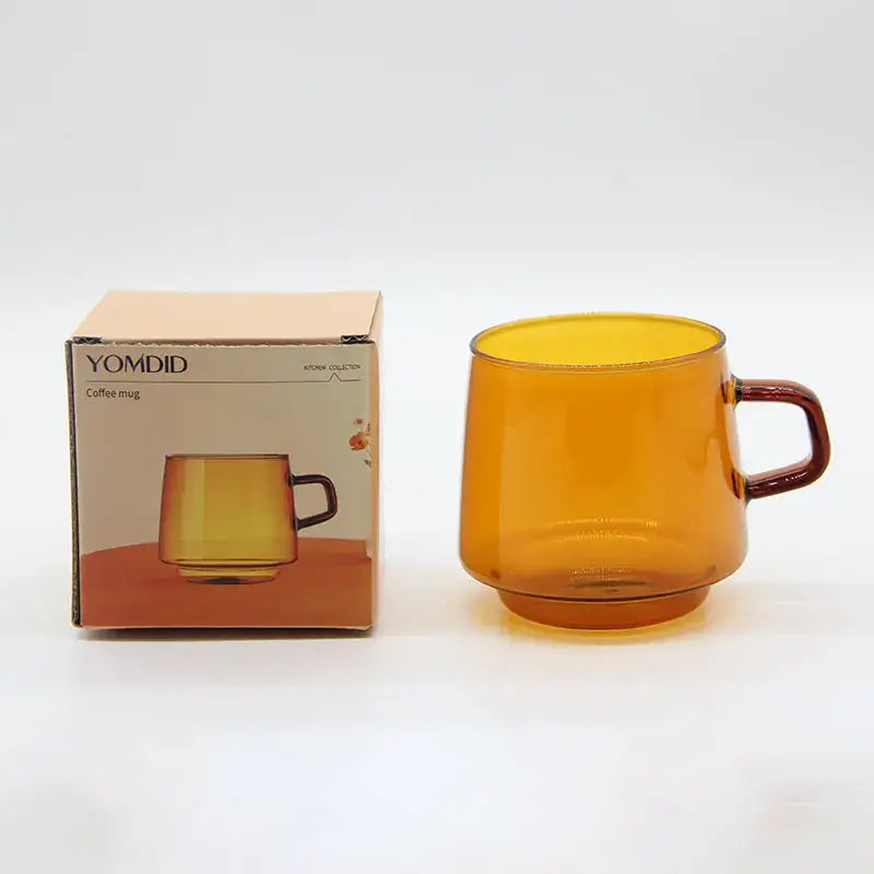 Modern amber glass coffee mug with black rim for kitchen dining room