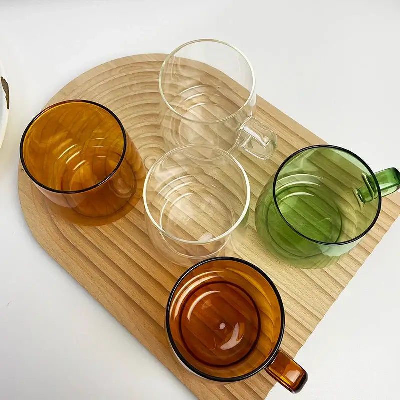 Modern amber glass coffee mug with black rim for kitchen dining room