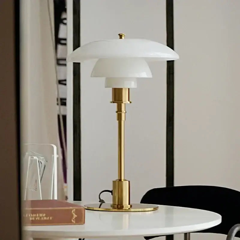 Modern amber glass desk lamp for living room with golden brass finish