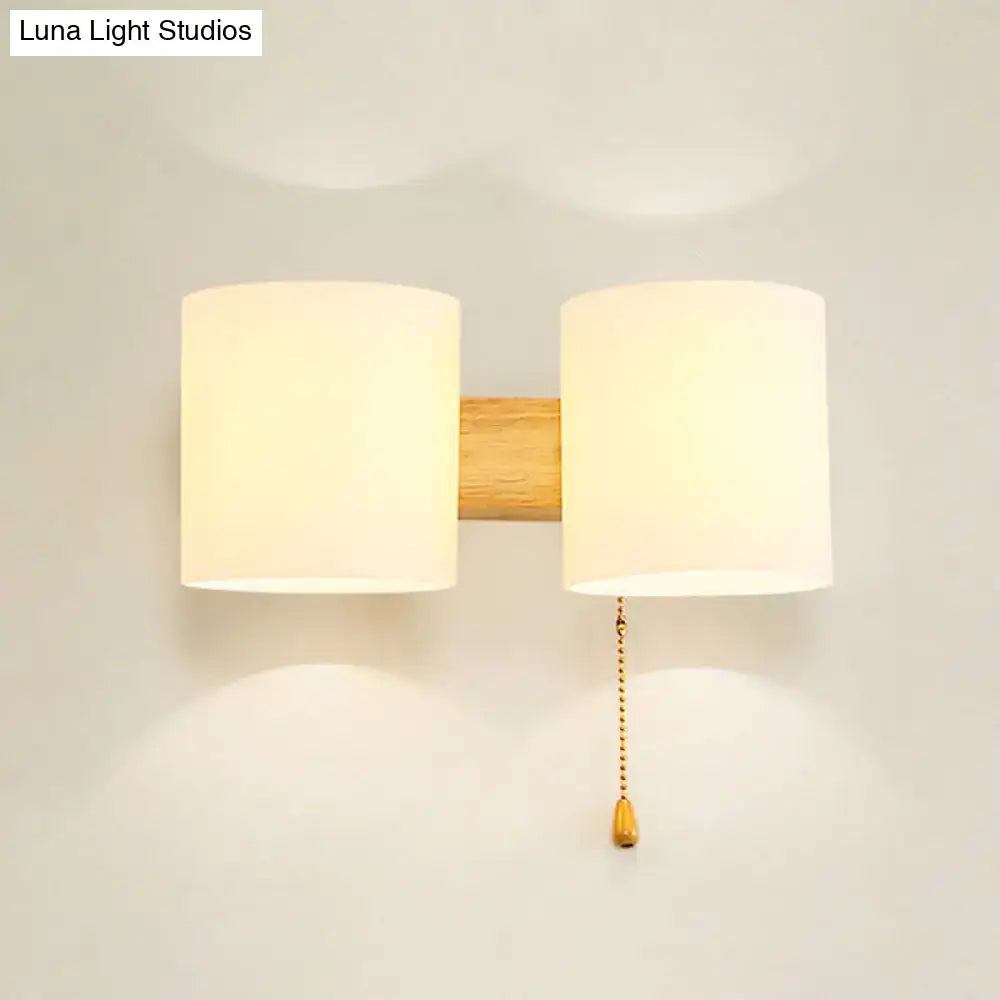 Modern beige fabric and wood wall light bedroom sconce with pull chain