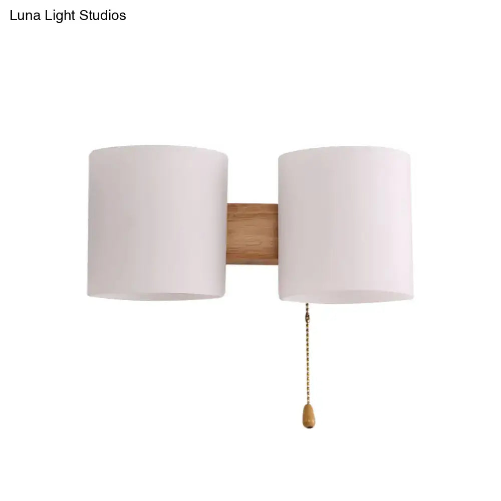 Modern beige fabric and wood wall light bedroom sconce with pull chain