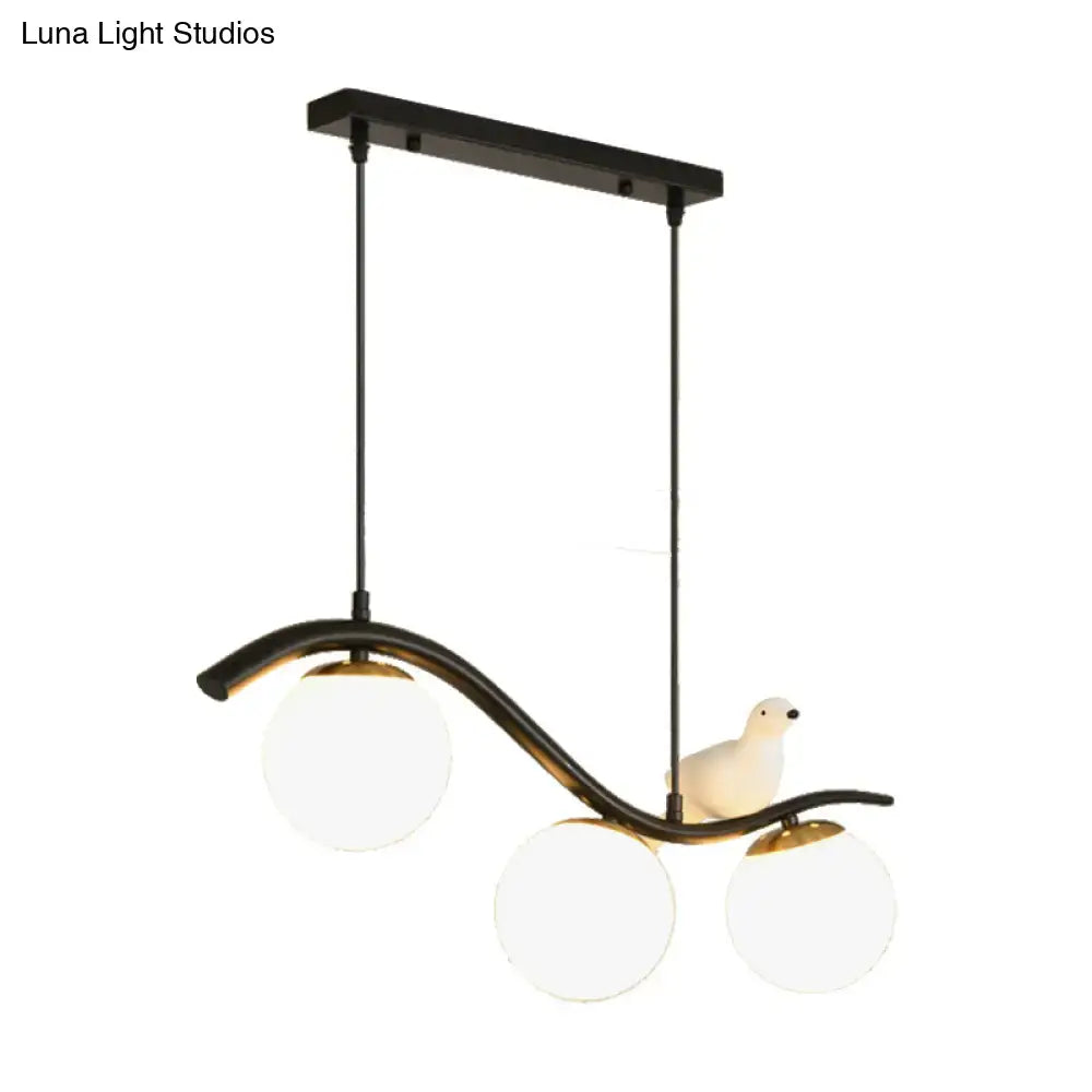 Modern black 3 light dining room pendant with clear white glass ball shade