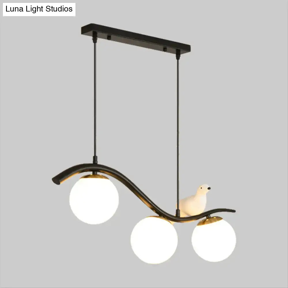 Modern black 3 light dining room pendant with clear white glass ball shade