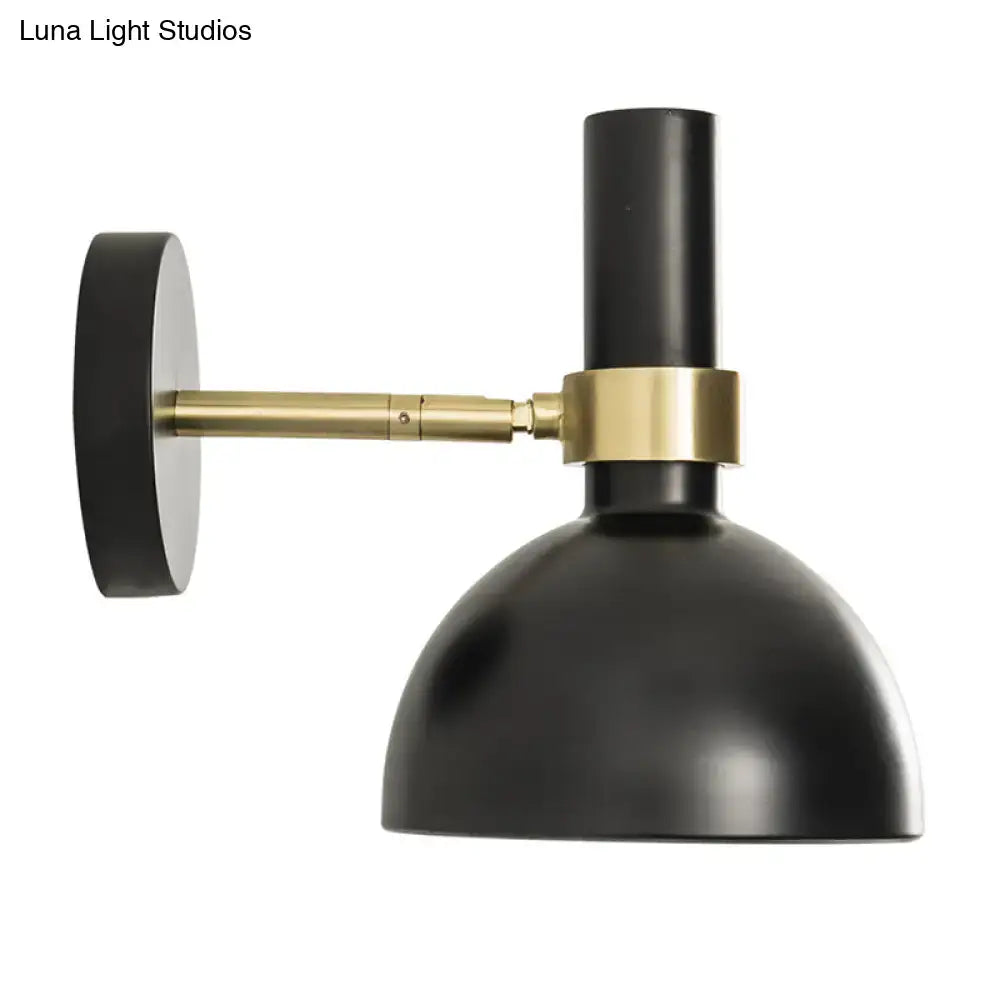 Modern black and brass domed wall lamp for bedroom bedside