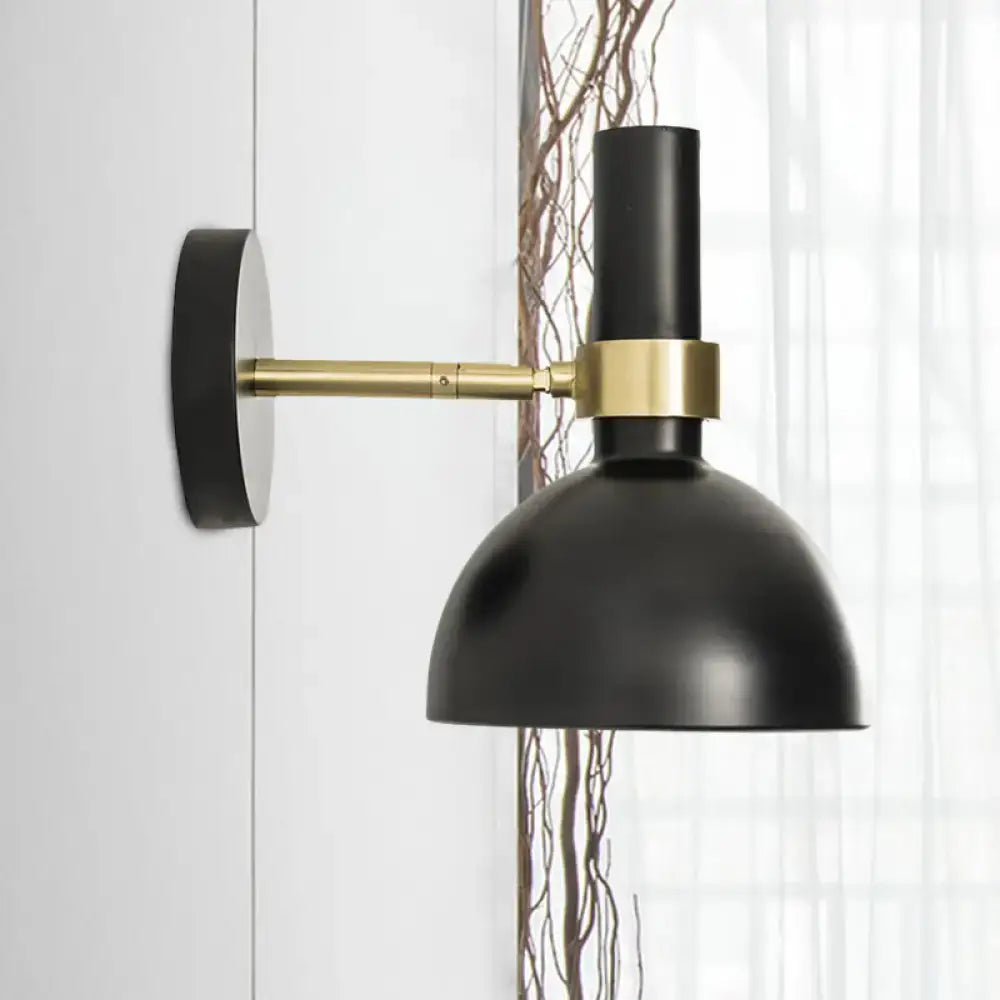 Modern black and brass domed wall lamp for bedroom bedside
