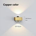 Modern black and copper bedroom wall lamp with glass dome