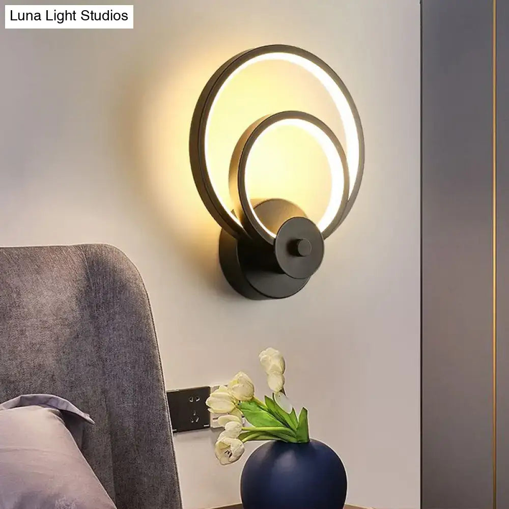 Modern black circular led light fixture – bedroom wall sconce