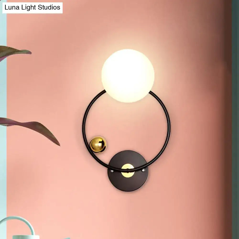 Modern black & gold wall sconce light with opal glass shade bedroom