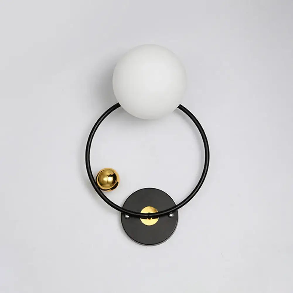 Modern black & gold wall sconce light with opal glass shade bedroom