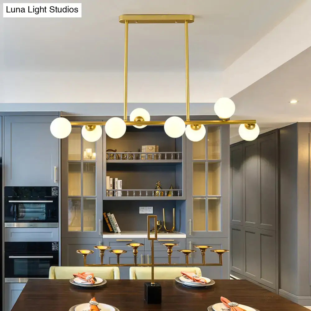 Modern black island ceiling light with frosted globes dining room