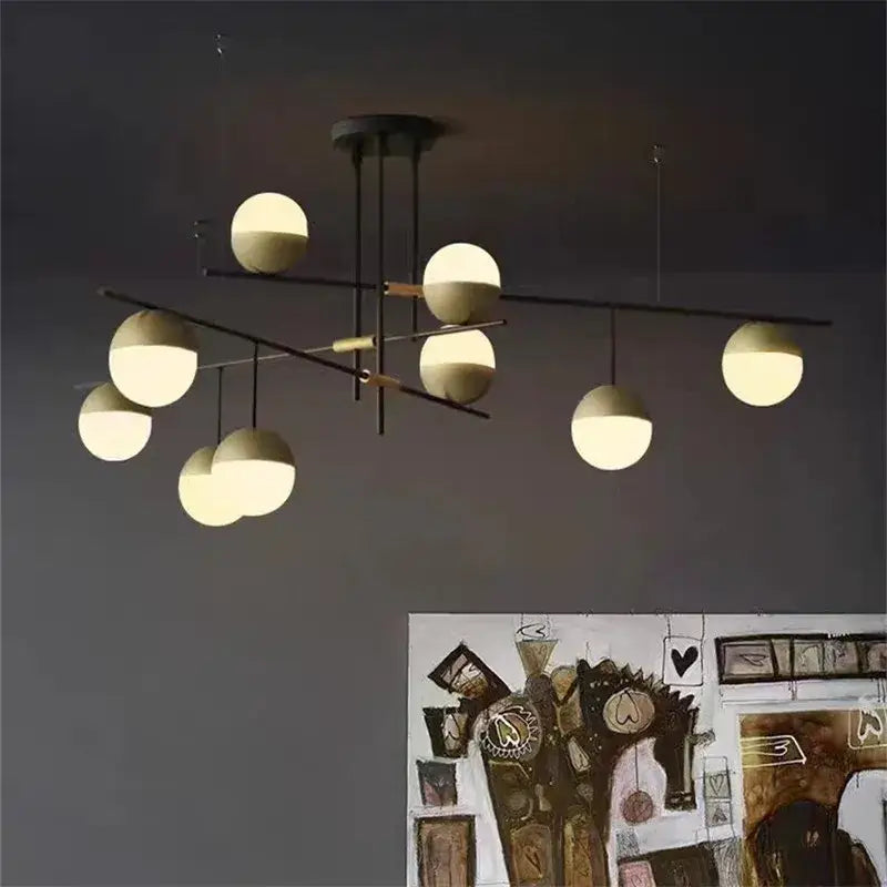 Modern black linear chandelier with glass ball shades for kitchen