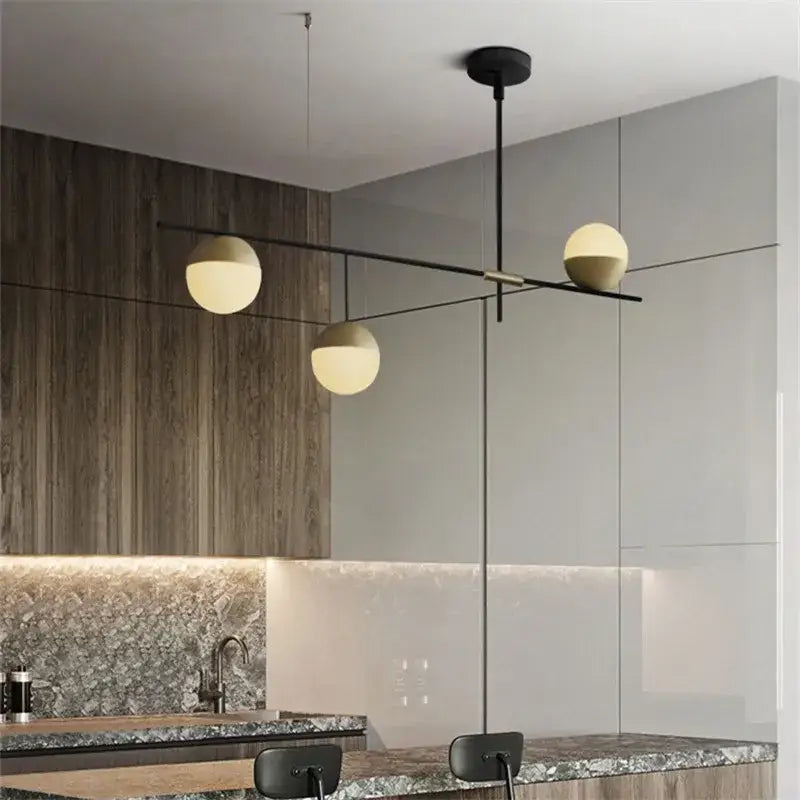 Modern black linear chandelier with glass ball shades for kitchen