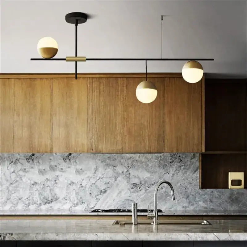 Modern black linear chandelier with glass ball shades for kitchen