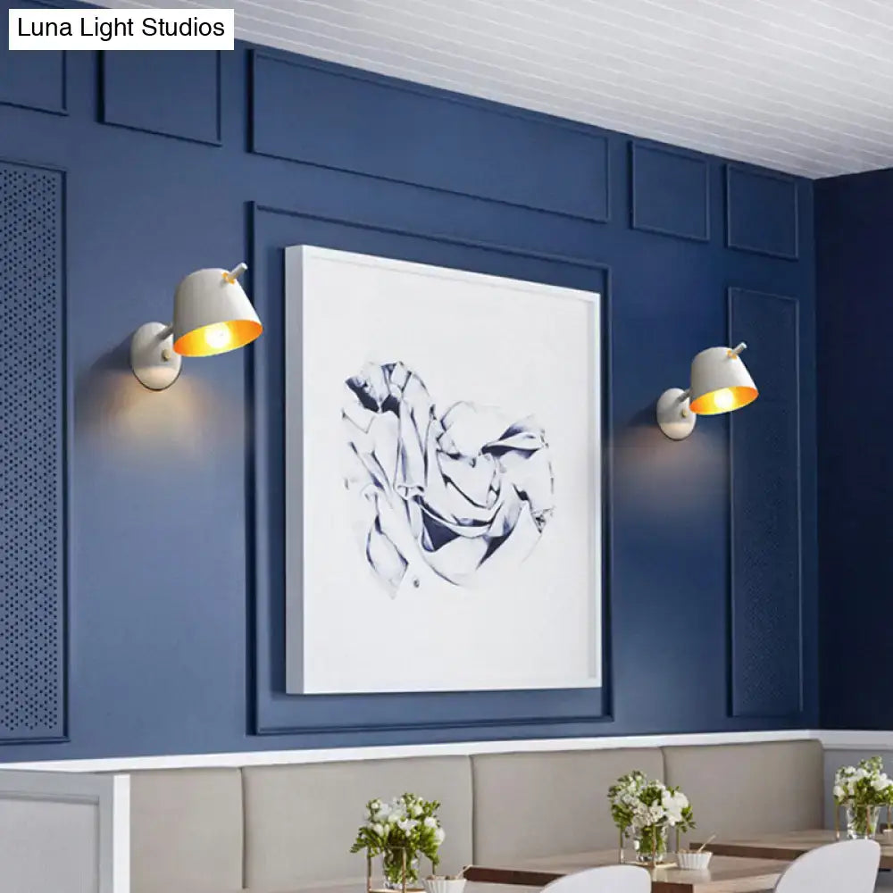 Modern black metal shade wall sconce with white & blue bedroom light