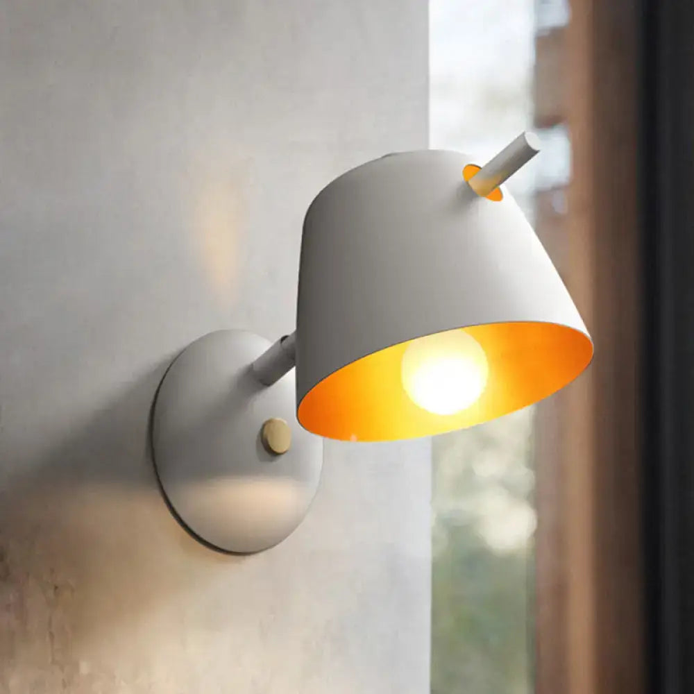 Modern black metal shade wall sconce with white & blue bedroom light