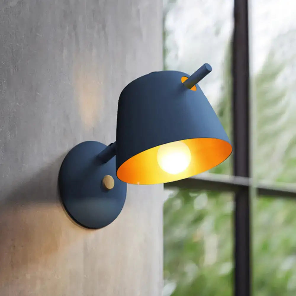 Modern black metal shade wall sconce with white & blue bedroom light