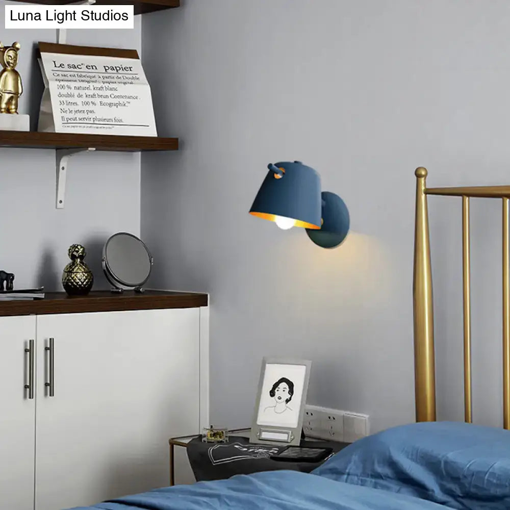 Modern black metal shade wall sconce with white & blue bedroom light