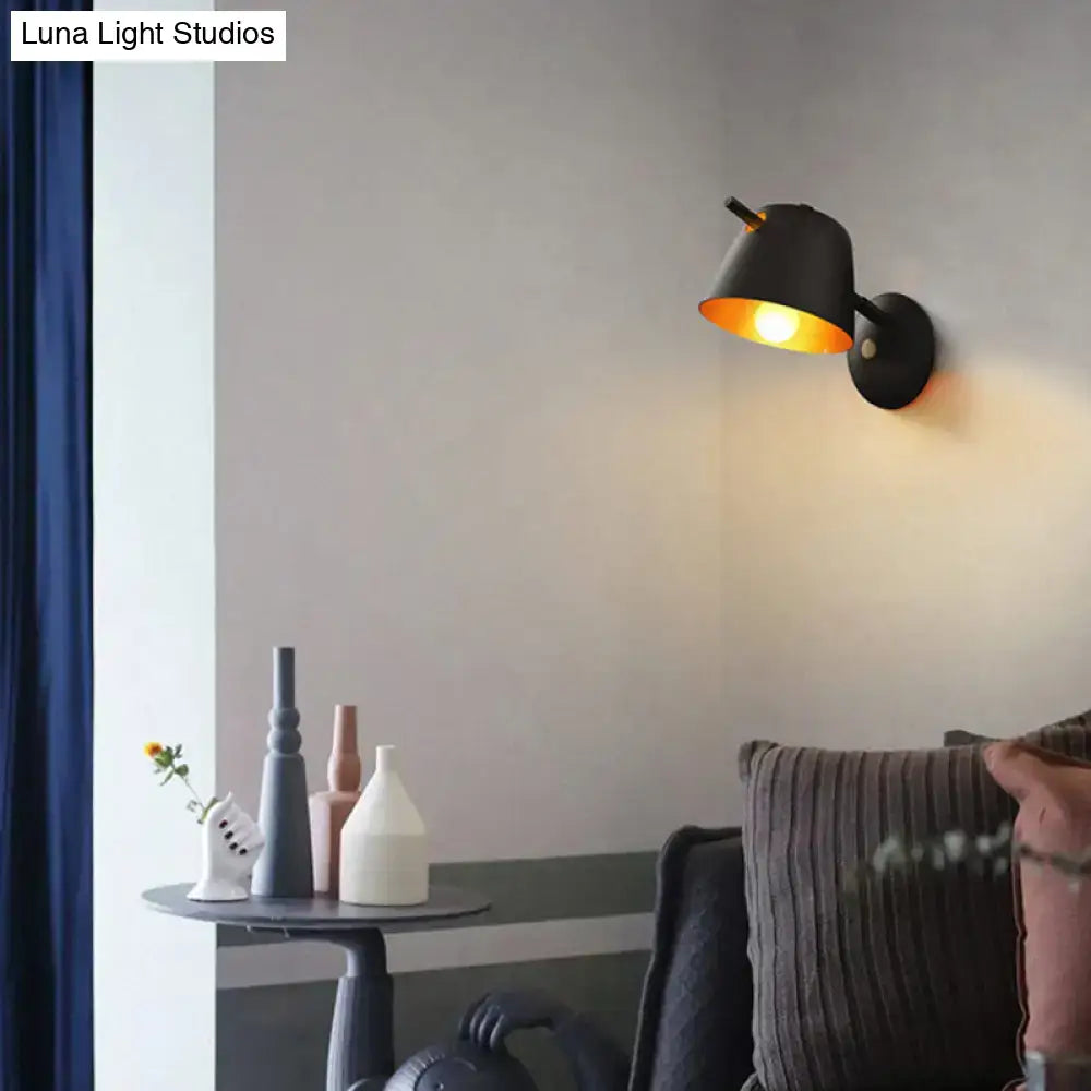 Modern black metal shade wall sconce with white & blue bedroom light