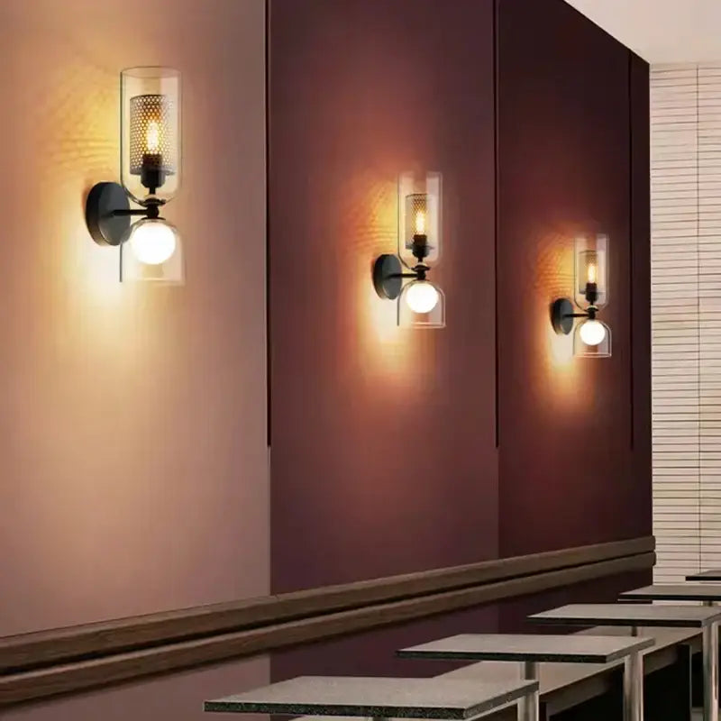 Modern black metal wall light with clear glass – bedroom sconce