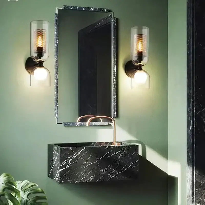 Modern black metal wall light with clear glass – bedroom sconce