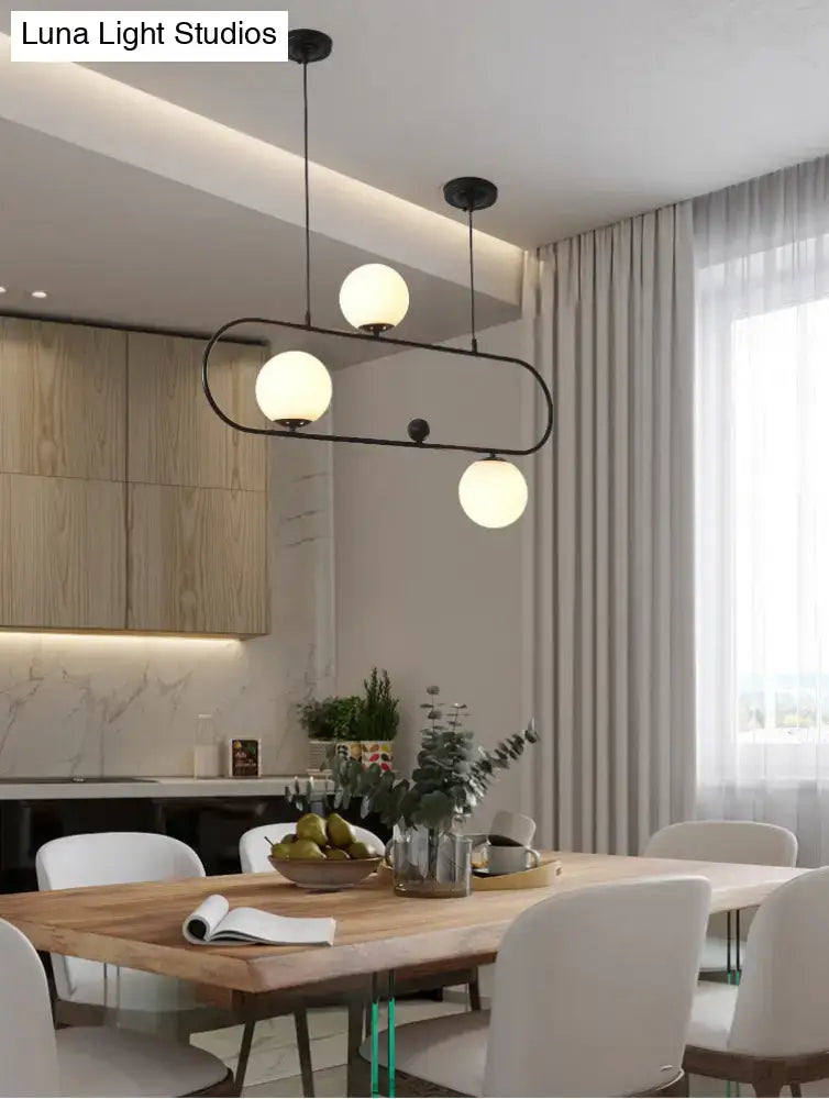Modern black minimalist ellipse ceiling light with white globes living room