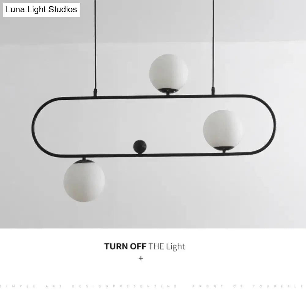 Modern black minimalist ellipse ceiling light with white globes living room
